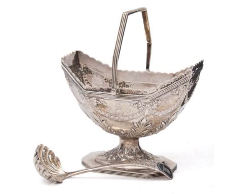 A Victorian silver swing handled pedestal sugar basin, maker Sibray, Hall &amp; Co, London, 1886: crested, of lozenge-shaped 