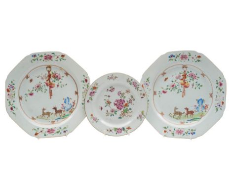 A pair of Chinese famille rose plates and one other: the pair painted with a stag and doe, a hanging gourd, rockwork, flowers