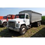 1985 International S1900 grain truck, DT466, 7 spd, 226” WB, tandem axle, roll tarp, spring ride