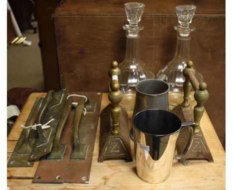 Pair of glass decanters, four vintage brass door handles, pair of firedogs and two tankards   Condition: 