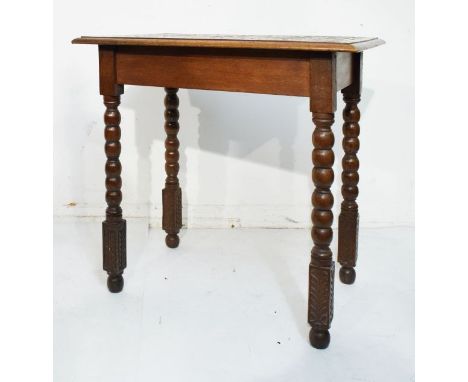 Early 20th Century carved oak rectangular topped occasional table on bobbin turned supports   Condition: 