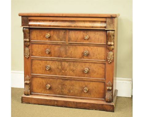 Victorian mahogany chest fitted one long cushion shaped drawer to the frieze, two short and three long drawers below and stan