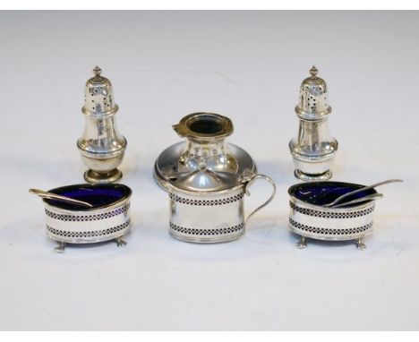 George VI silver three piece condiment set, Birmingham 1938, a pair of silver baluster shaped pepperettes, hallmarks worn and