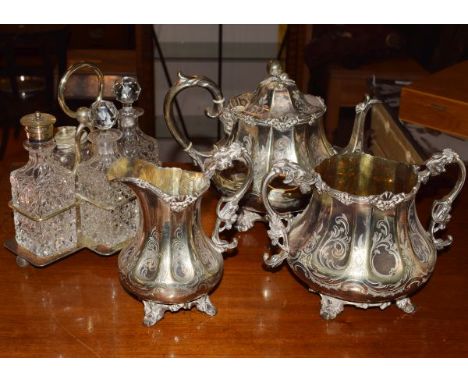 Victorian engraved silver plated three piece tea set, together with a silver plated framed four bottle cruet   Condition: 