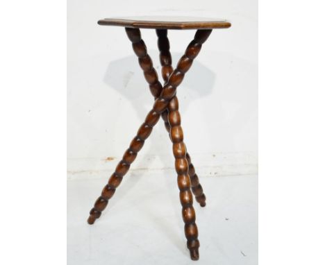 Early 20th Century oak octagonal topped occasional table on bobbin turned supports together with a small lacquered occasional