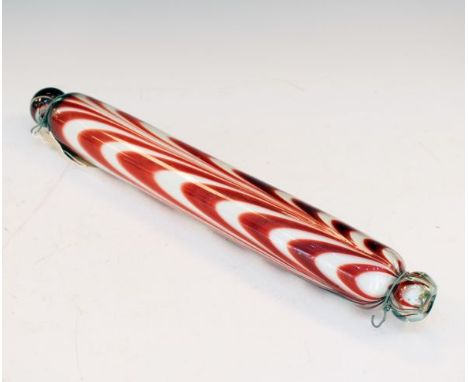 19th Century Nailsea type glass rolling pin having red combed decoration   Condition: 