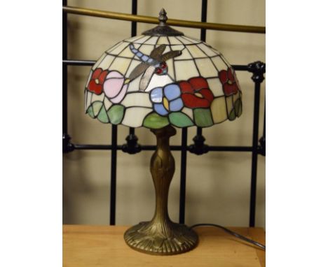 Modern table lamp having a stained and leaded glass style shade   Condition: 