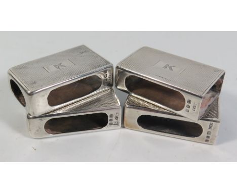 A George VI Set of Four Silver Match Box Holders with engine turned decoration and initial K, London 1937, SJ Rose & Son, 72 