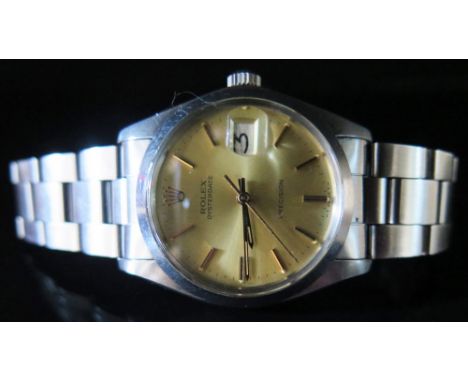 A Rolex Ref; 6694 Oysterdate Precision Gents Watch in steel case with champagne dial, 7835 steel bracelet, mechanical precisi