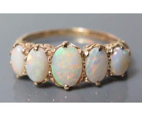 An Opal Five Stone Ring, size Q.5, 3.1 g