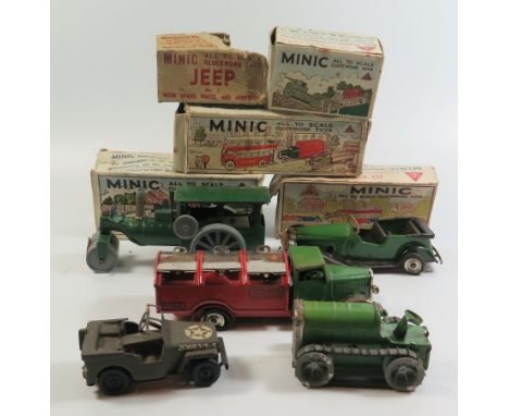 Five Minic Clockwork Toys: Tractor, Jeep, Dust Cart, Steam Roller and car, boxed with faults