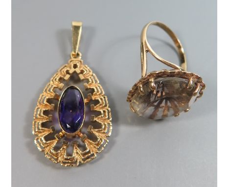 A 9ct Gold Smoky Quartz Ring and 9ct Amethyst pendant, 13.8 g