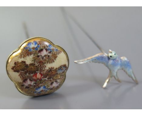 An Edward VII Silver and Enamel Hat Pin in the form of a bird in flight and a Japanese Satsuma mounted hat pin decorated with