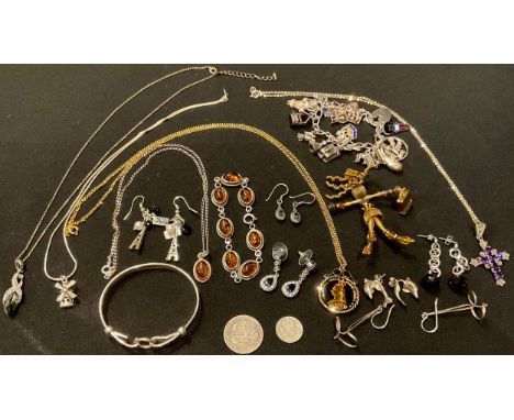 A silver bangle, by Silvarious, marked 925; other sterling silver jewellery, an amber necklace and bracelet part suite, boxed