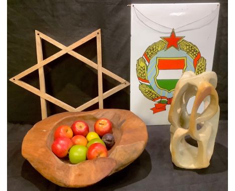 A Hungarian enamel Communist party sign, 60cm x 40cm, c.1960;  A large naturalistic carved wooden fruit bowl, with associated