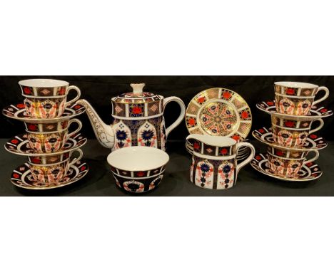 A Royal Crown Derby 1128 tea service for six comprising teapot, cream jug, sugar bowl, side plates, cups and saucers, all fir