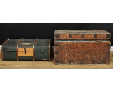 A metal bound pine trunk or chest, 51cm high, 98cm wide, 52cm deep; a vintage case, 32cm high, 92cm wide, 53cm deep (2) 