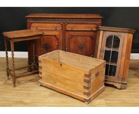 A 17th century style oak low dresser, 92cm high, 122cm wide, 47.5cm deep; an oak occasional table, 73.5cm high, 56cm wide, 40