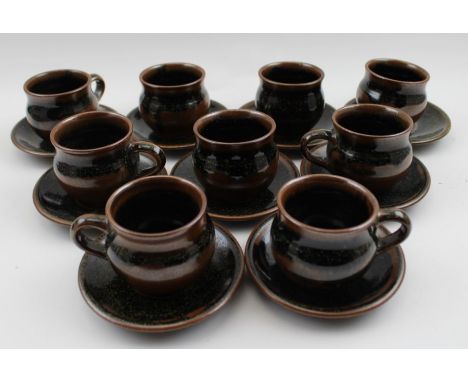 A set of nine Winchcombe pottery glazed stoneware coffee cups and saucersCondition report: They are 6cm high, the rim of the 