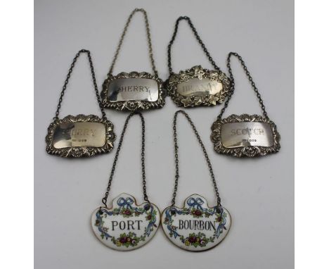 Six various wine / spirit labels, both silver and ceramic, includes; Scotch, Sherry, and Brandy, combined silver weight: 39g