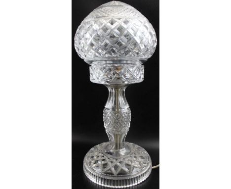 A 20th century cut lead crystal lace lamp, the globe shade with star cut point, hobnail bands, on circular base, 34cm high