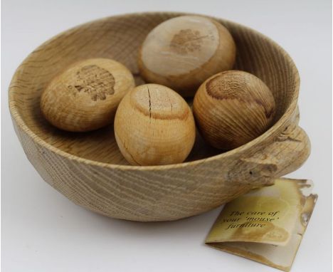 A Robert Thompson of York "Mouseman" carved oak bowl, adzed outside edge with signature mouse, 15.3cm in diameter, contains f