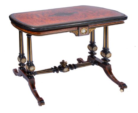 A VICTORIAN AMBOYNA AND EBONISED CARD TABLE with fold over top, green baize playing surface and on fluted tapering legs inset