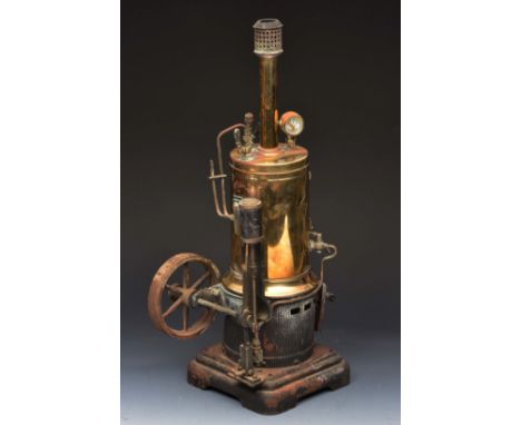 A GERMAN, WURTEMBREG STEAM ENGINE with cylindrical brass body and stepped base, 44cm high