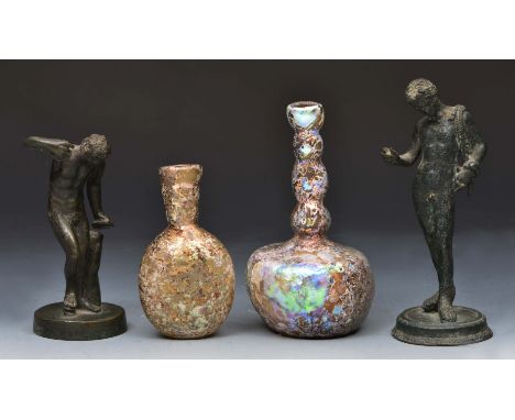 TWO GRAND TOUR MINIATURE BRONZES AFTER THE ANTIQUE, 14 and 11cm high, an iridescent glass bottle with baluster neck, 12cm hig