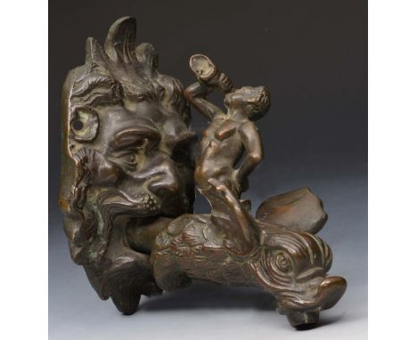 AN ANTIQUE ITALIAN BRONZE FOUNTAIN OR CISTERN TAP in the form of a dolphin with triton and mask back plate, 17cm