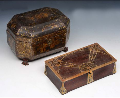 AN ART NOUVEAU HARDWOOD, POSSIBLY ROSEWOOD CASKET with brass inlaid hinged lid, pierced brass clasp and corner mounts, the ba