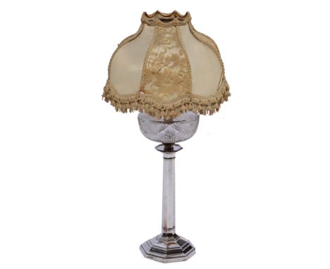 A SILVER PARAFFIN LAMP with cut glass reservoir with octagonal column support and base, hallmarks for Sheffield 1911 (convert