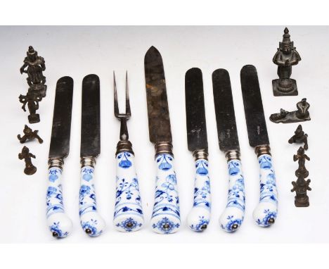 A SET OF FIVE 19TH CENTURY TABLE KNIVES with blue and white porcelain pistol grip handles, a matching carving knife and fork;