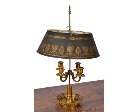 A FRENCH GILT METAL FOUR BRANCH LIBRARY TABLE LAMP with Toleware shade and pierced base, 62cm high overall