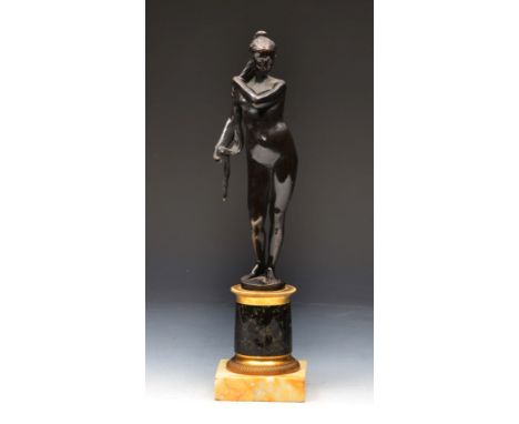 A PATINATED BRONZE FIGURE of Venus after the Antique, the subject standing on an ormolu mounted serpentine and marble plinth,