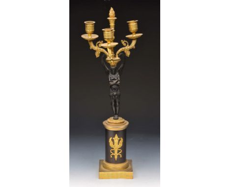 A FRENCH EMPIRE STYLE BRONZE THREE BRANCH CANDELABRUM with winged angel support, 48cm high