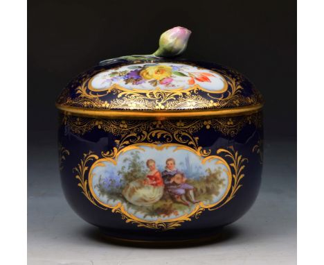 A MEISSEN COBALT BLUE GROUND SUCRIER AND COVER with painted floral decoration within a gilded cartouche, 11cm diameter