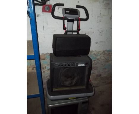 A SELECTION OF FOUR ELECTRICAL ITESM TO IONLCUDE AN AMPLIFIER, A VIBRATION MACHINE A MICROWAVE AND A PANASONIC MOVIE CAMERA (