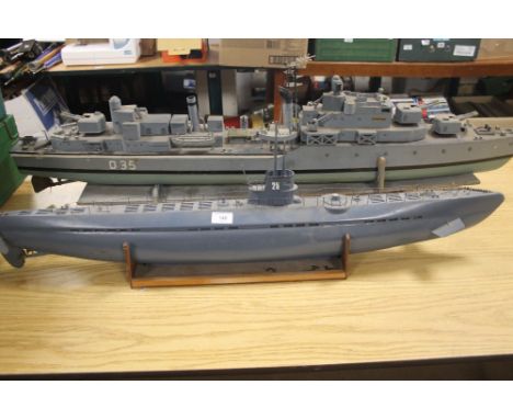 SCRATCH BUILT D35 ROYAL NAVY BATTLESHIPS 127CMS,  TOGETHER WITH A MODEL SUBMARINE 106CMS