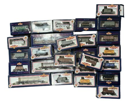 Twenty seven Bachmann Branch Line '00' gauge goods and tank wagons, including two 30 Ton Bogie Bolster wagons and two sets of