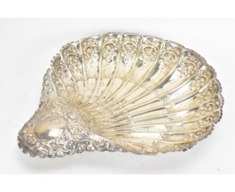 A Victorian silver shell shaped serving dish by Atkin Brothers, hallmarked Sheffield 1892, having a crimped edge, embossed wi