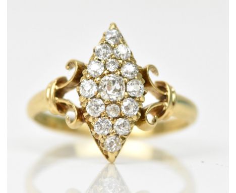 An early 20th century 18ct yellow gold diamond cluster dress ring, signed Newman to the shank, of navette form with fifteen o