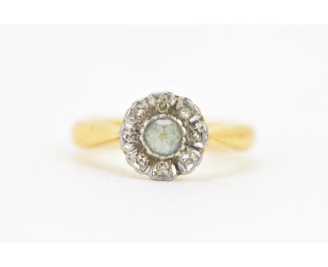 A 22ct yellow gold, diamond and topaz cluster dress ring, set with a central faceted cut topaz surrounded by diamonds, size K