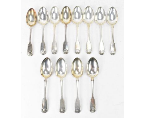 A Victorian set of twelve silver dessert spoons by Lister &amp; Sons, hallmarked Newcastle 1843, each in the fiddle and shell