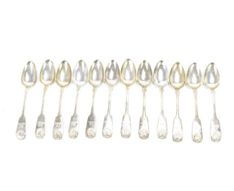 A William IV set of twelve silver teaspoons, hallmarked Edinburgh 1835, each in the fiddle and shell pattern and engraved wit