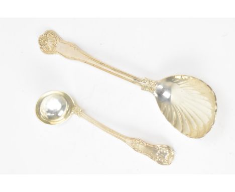 A Victorian silver serving spoon hallmarked London 1892, together with a silver ladle hallmarked Glasgow 1824, the serving sp