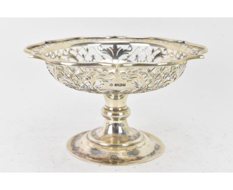 An Edwardian silver raised dish, by Copper Bros &amp; Sons Ltd, hallmarked Sheffield 1907, having a shaped rim pierced with v