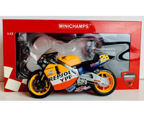 Minichamps 1/12 Scale 999 RS Gary McCoy WSB 2004 Team Honda Repsol Livery CONDITION REPORT: This item is not in the original 