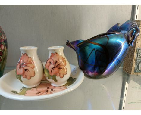 A Moorcroft Pottery plate, 20 cm diameter, two vases, 9 cm high and an art glass vase, 16 cm high (4)Glass vase 17 cm high No
