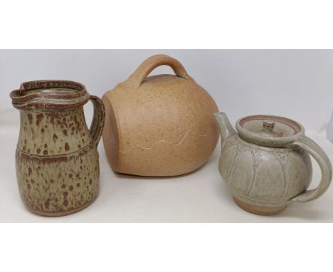 A John Leach, Muchelney, chicken brick, 25 cm wide, a studio pottery teapot, and a jug (3)Teapot handle has possibly been rep